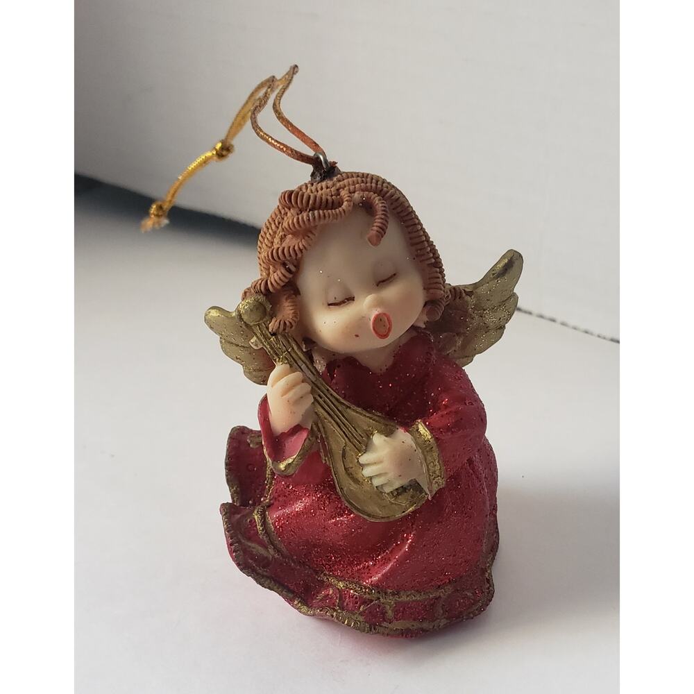 Singing Curly Haired Girl Angel Ornament Playing Instrument